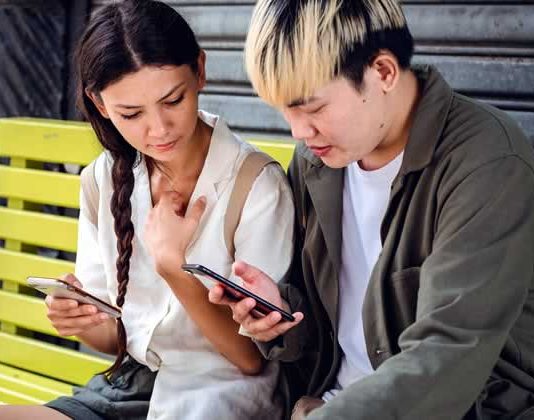 Couple working on phone